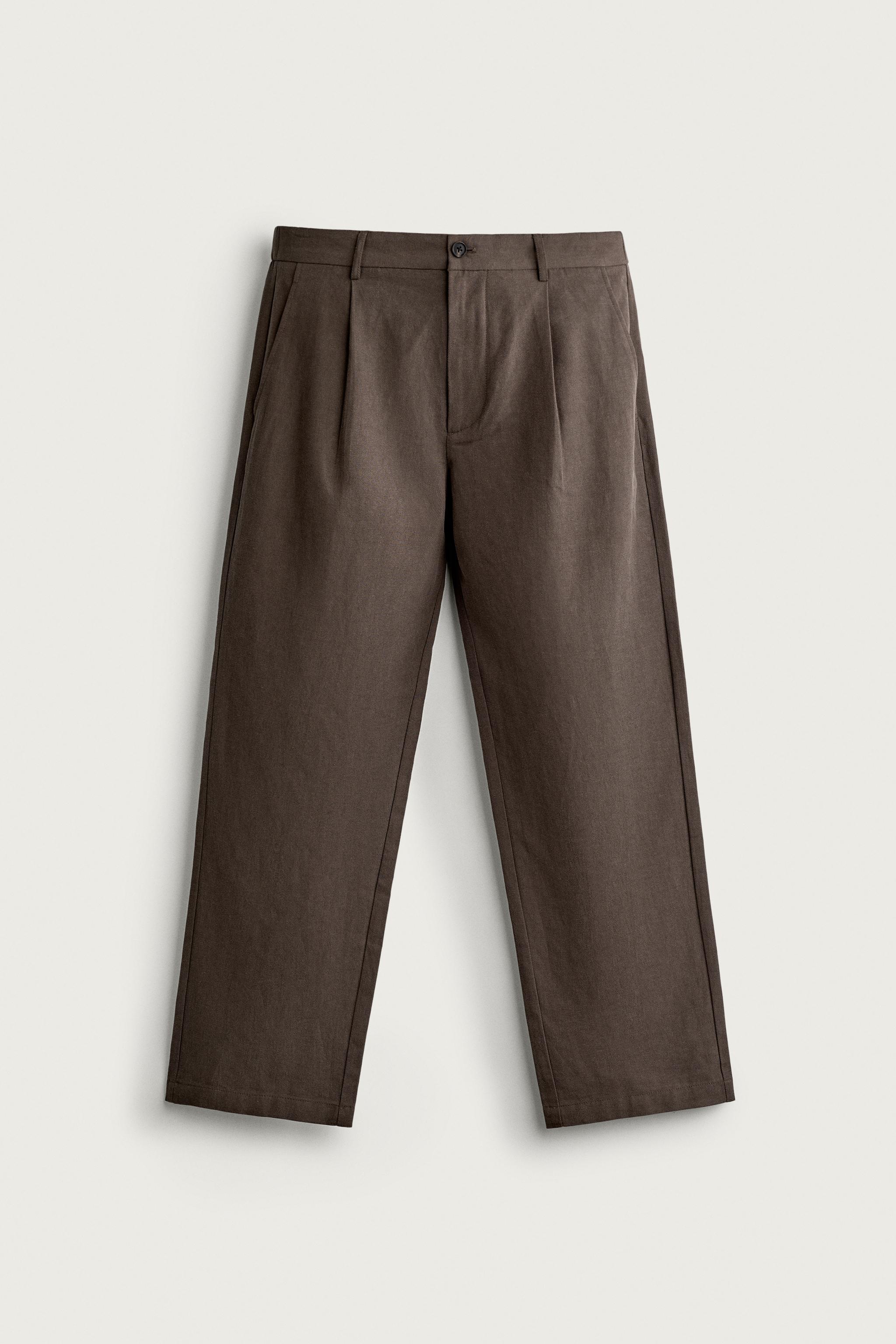 RELAXED FIT PLEATED PANTS